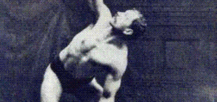 Old photo of man lifting barbell